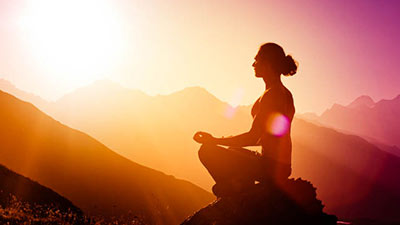 Village Family Clinic - Woman Meditating